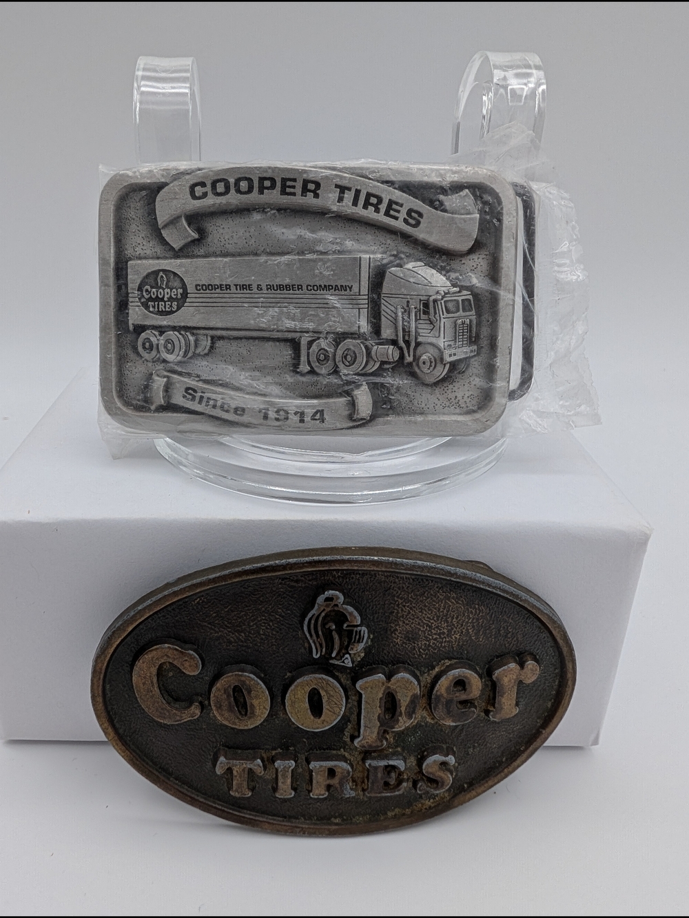 2 Cooper Tires Belt Buckles 80th Anniversary Vintage Pewter 1994 + 1970s Bronze
